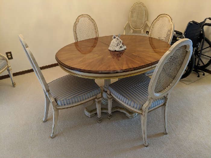 $175  French Provincial dining room set with two extra leaves and 6 chairs