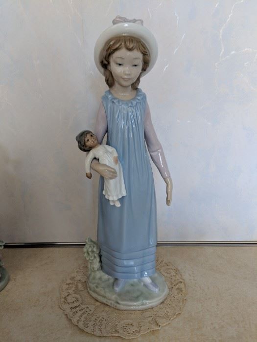 $75 Lladro girl with doll
