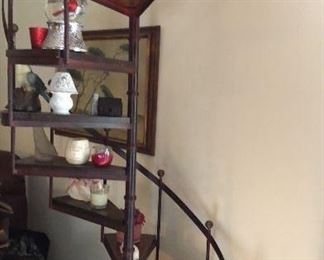 This spiral staircase what-not shelf is pretty cool