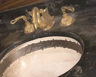 Beautiful marble vanity top with gilt swan faucet set and embossed sink
