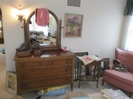 Fine looking dresser and a sexy red apron