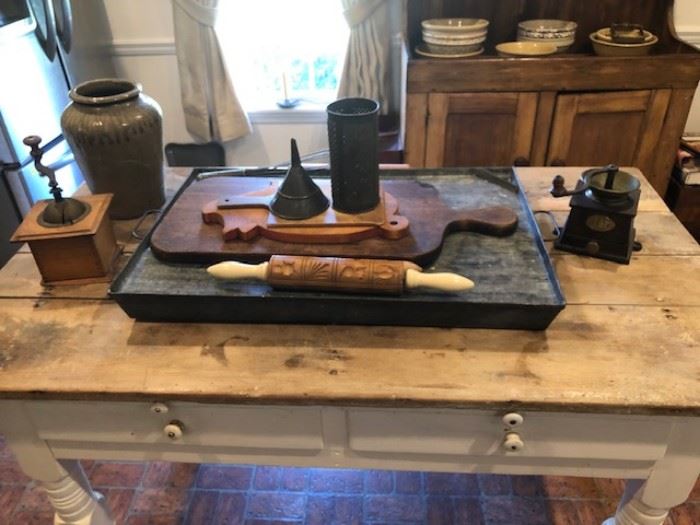 Farm table used as a kitchen island.