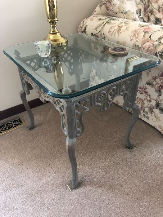 Wrought iron end table with glass top, rounded edges 