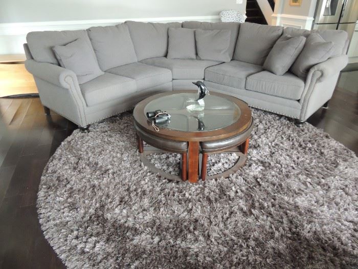 Kincaid sectional with matching chair and ottoman. Beautiful gray fabric,
