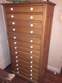 early 20th century Oak with glass knobs dental cabinet from Dr. Paul Cyr's dental office. 