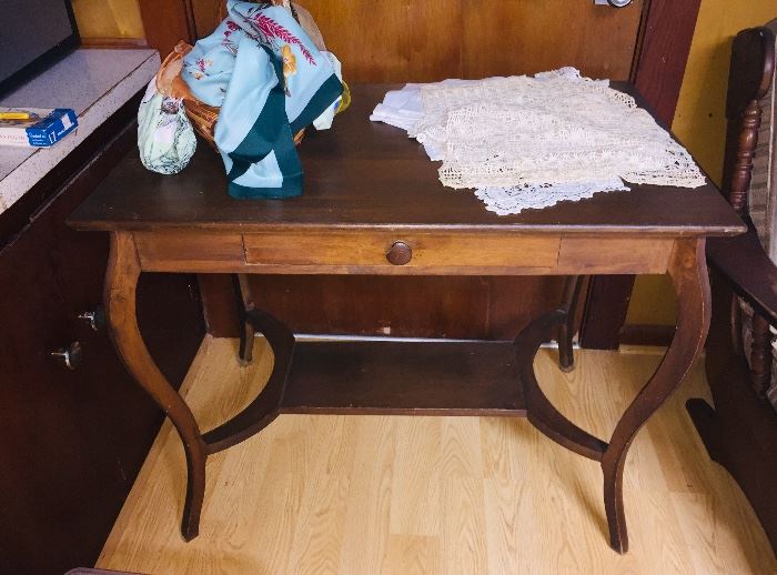 we have lace, early handkerchiefs, table cloths, quilts--everything vintage