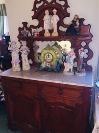 marble top side boards and do you see just a few of the figurines-