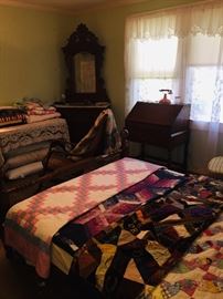 another view of little Walnut and marble dresser, the beautiful quilts, and a precious little writing desk