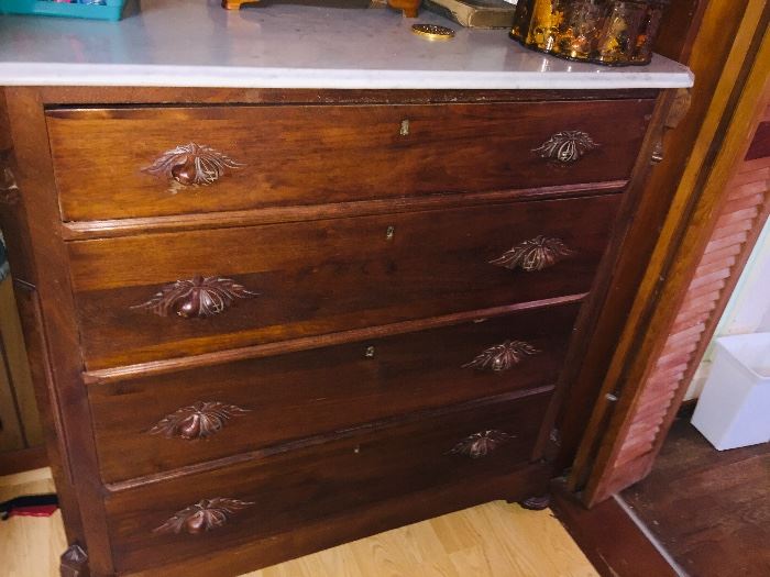 Walnut and marble top chest
