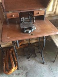 extremely early treadle leather sewing machine