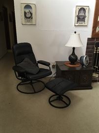 Leather rocker/recliner which swivels and has matching  footstool (2 sets of both)