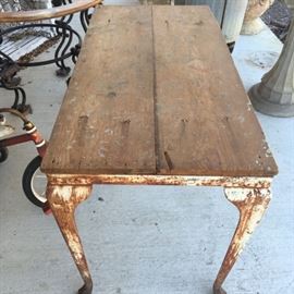 Vintage farm table (made with wood top and vintage oven legs)