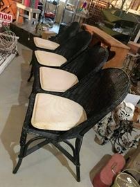 Vintage black wicker chairs with cushions