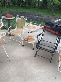 Various vintage iron outdoor furniture pieces