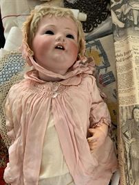 Several antique dolls