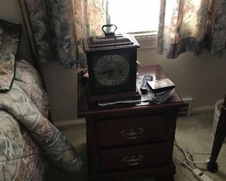 Another wind up mantle clock! Sitting  on a nice sized 2 drawer nightstand!