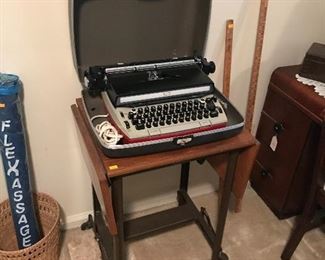 Electric typewriter on rolling stand!