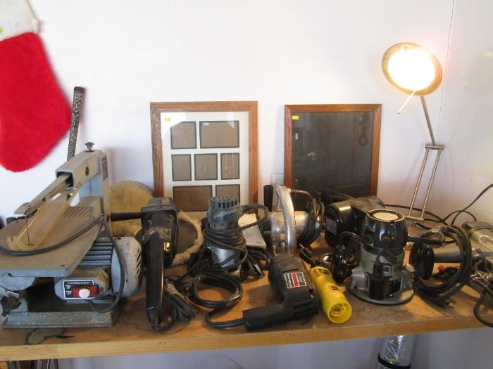 2-Tables of Power Tools: Band Saw, Router, Sanders, Craftsman Drill, Planer and Band Saw, Impact Drill, Craftsman Battery Powered Circular Saw, Variety of Paint Sprayers, Ohaus Triple Beam Balance Scale + Smaller Version