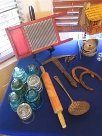 Older Treasures:  Glass Insulators, Washboard, Kitchen Utensils, Tool and Horseshoes 
