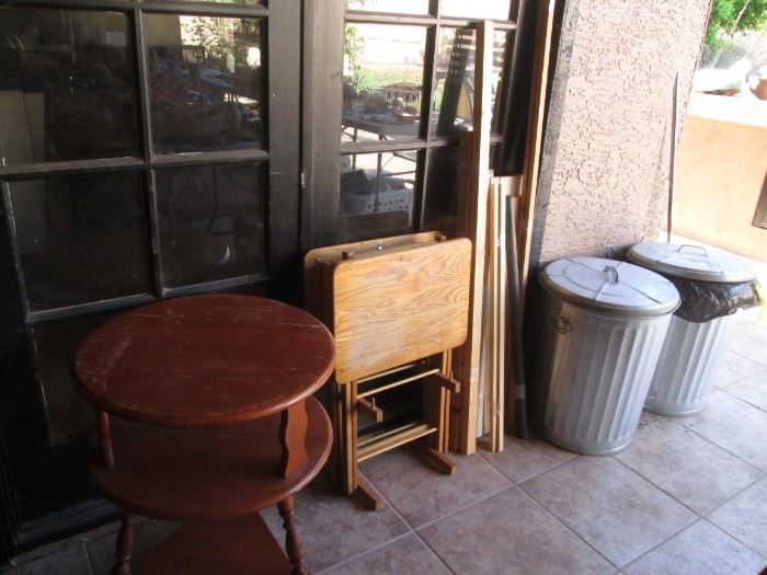 Beginning pictures of items on patio and in back yard.  3-Shelf End Table, TV Trays & Garbage Cans