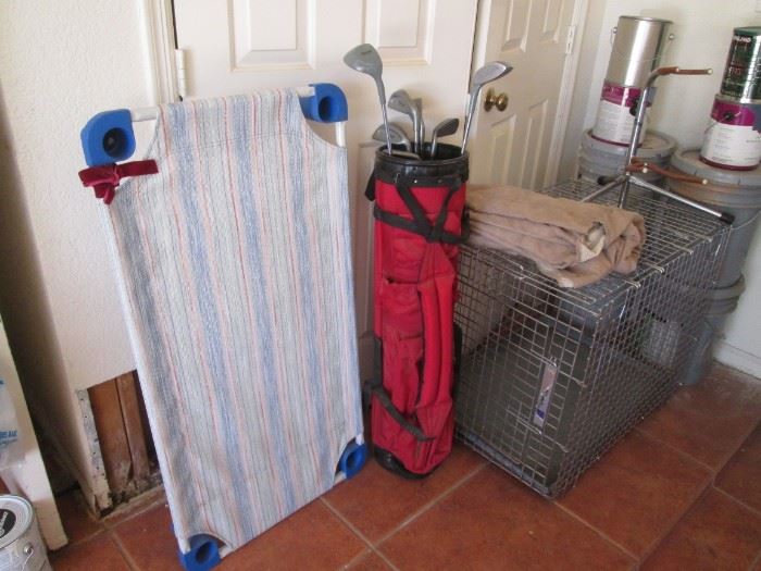 Beginning of Pictures of Items in Garage.  Doggy Bed and Pet Crate + Set of Golf Clubs