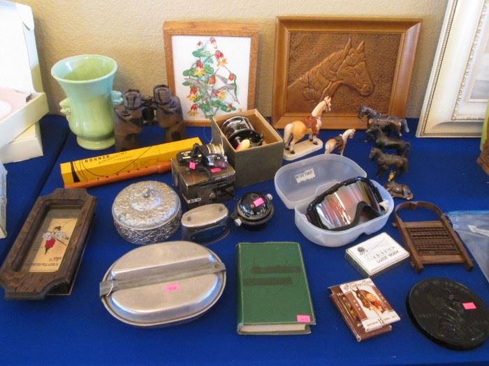Vintage Tables:  Girl Scout Handbook, Metal Horses, Copper Picture, Fishing Reels, Compass, Ski Goggles & Lovely Vase!