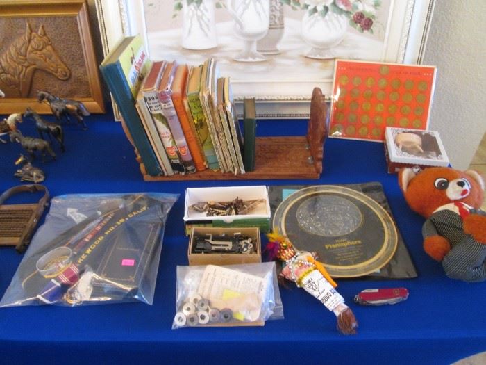 2nd Vintage Table:  1970's Talking Bear, Children's Books, Service Awards & Memorabilia, Vintage Sewing Machine Parts, 1980's Planisphere Disc, Presidential Coin Set.