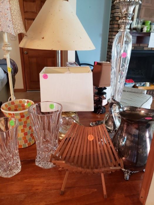 book holder, lamps, crystal vases, pitcher