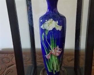 There are a pair of these enameled vases
