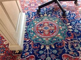 Detail of floral medallion to  Tabriz rug in office