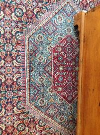 Bidjar design with diamond shaped medallion on a deep navy ground