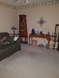 Love seat $75, corner lighted hutch $97. Table $55.