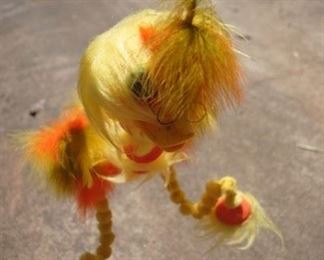 1970s handmade puppet from feathers and other material.