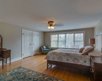 5 x 8 wool rug, antique vanity, queen bed, bedding and lighting