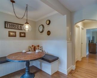 round kitchen table with barnwood top and metal banding