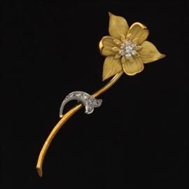 A Gold and Diamond Flower Brooch 