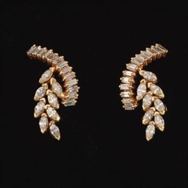 A Pair of Gold and Diamond Earrings 