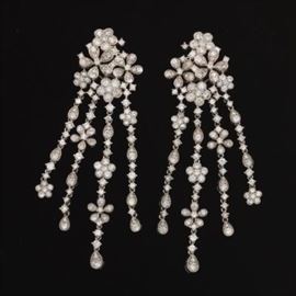 A Pair of Gold and Diamond Flower Dangling Earrings 