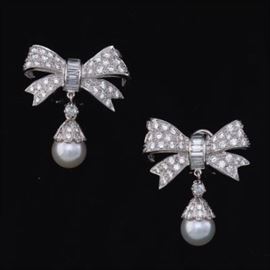 A Pair of Platinum, Gold, Pearl and Diamond Bow Earrings 