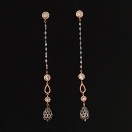 A Pair of White, Rose Gold, And Diamond Pendant Earrings 