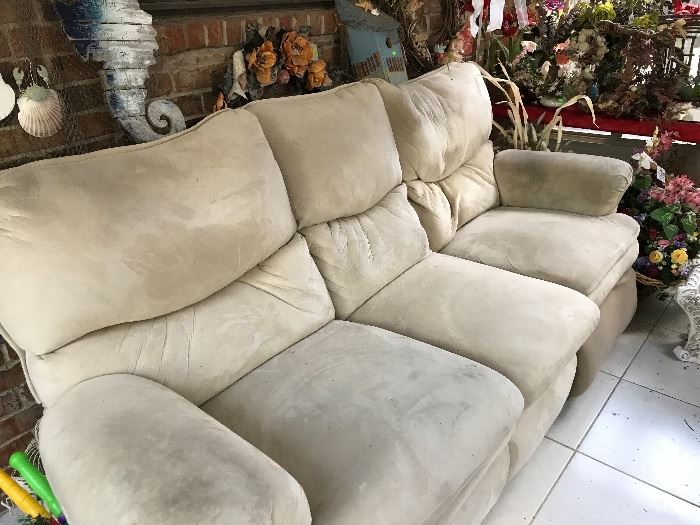 Reclining Sofa (needs cleaning) priced accordingly