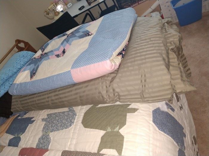 The homemade quilt is gorgeous and BIG and in perfect condition!