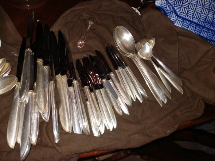 91 piece set of Rythm Sterling Silver
In beautiful condition!