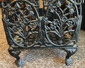 Cast iron magazine or book holder.