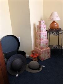 Hats, boxes, metal table and gourd lamp
