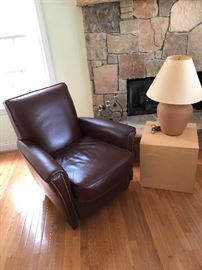 Comfortable chair, table and pottery lamp