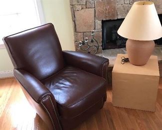 Comfortable chair, table and pottery lamp