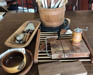 A collection of cheese tools, boards and more