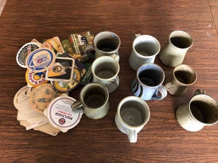 A collection of stoneware coffee mugs