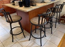 Set of four wrought iron barstools